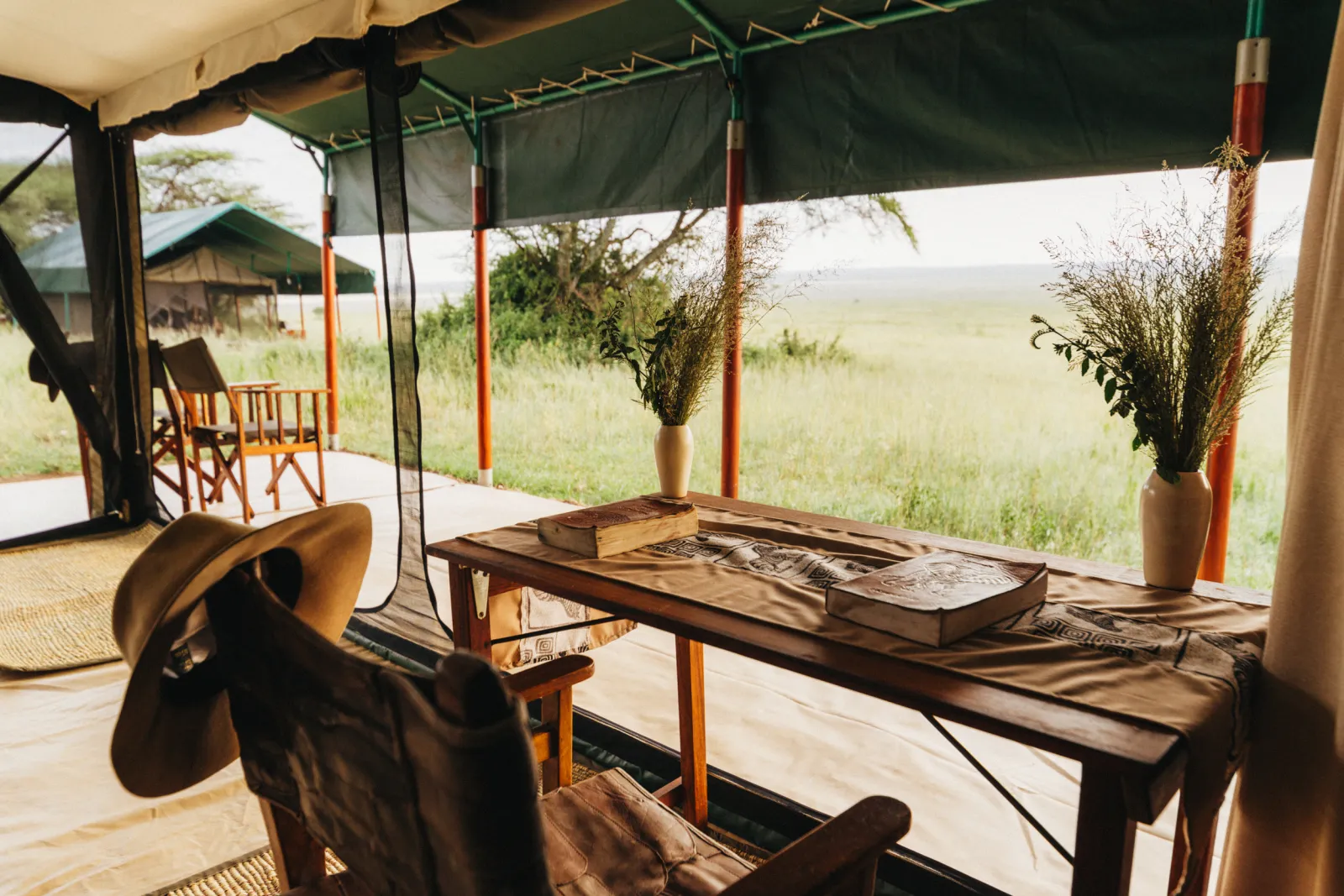 A writing table on the veranda of a Serengeti camp tent